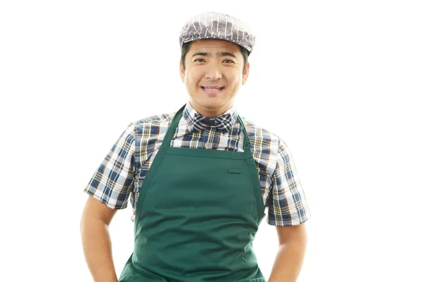 Lächelnder asiatischer Kellner — Stockfoto