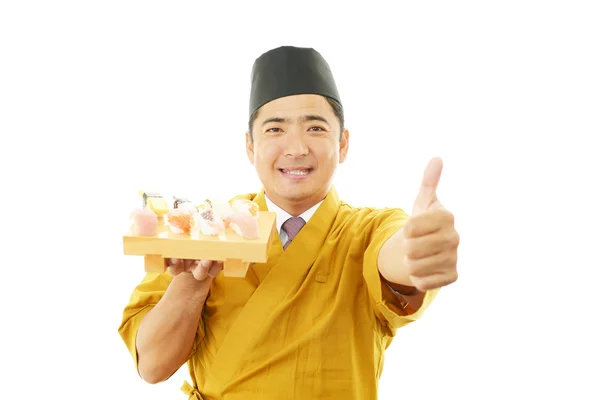 Porträtt av en sushikock i uniform — Stockfoto
