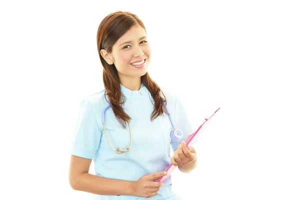アジアの女性看護師の笑みを浮かべてください。 — ストック写真