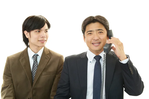 Smiling Asian businessmen — Stock Photo, Image