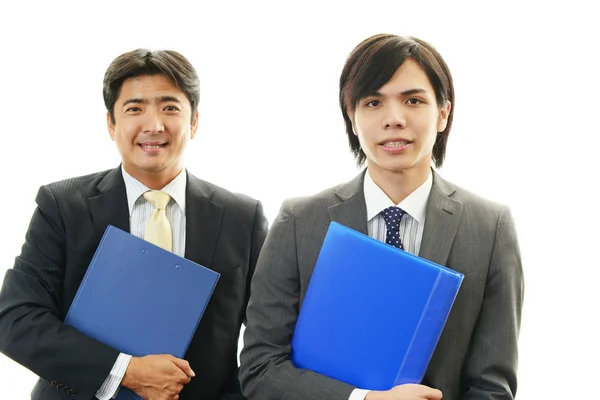 Smiling Asian businessmen — Stock Photo, Image