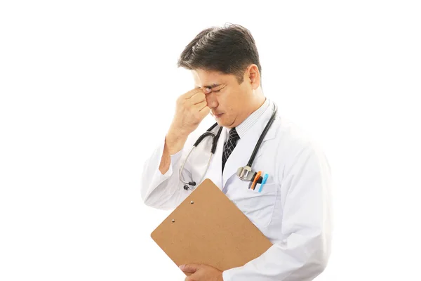 Tired and stressed doctor — Stock Photo, Image