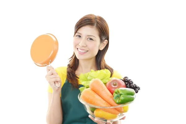 A woman wearing apron — Stock Photo, Image