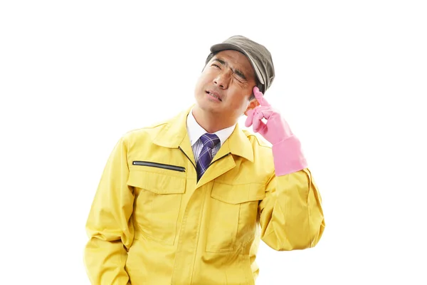 Tired and stressed Asian worker — Stock Photo, Image