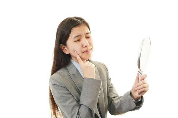 Woman with a mirror — Stock Photo, Image