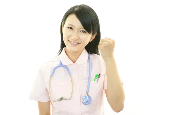 Lächelnd asiatische Krankenschwester — Stockfoto