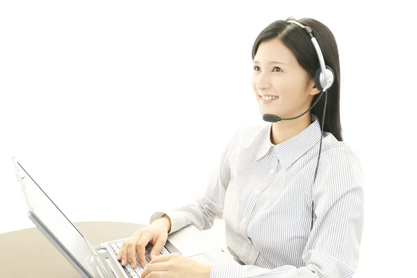 Smiling call center operator — Stock Photo, Image