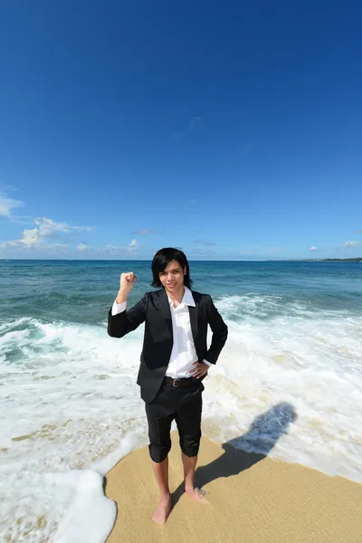 Man op het strand — Stockfoto