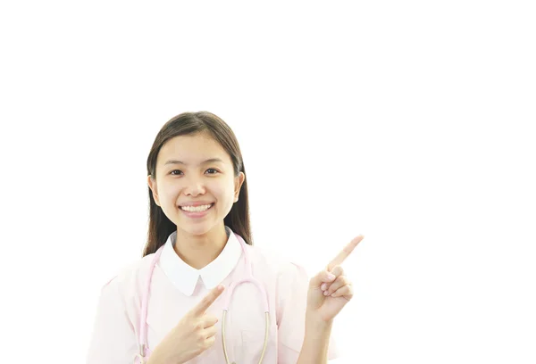 Asyalı kadın hemşire gülümseyen — Stok fotoğraf