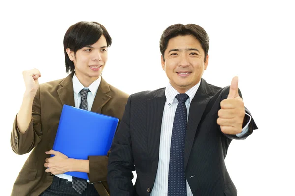 Lächelnde asiatische Geschäftsleute — Stockfoto