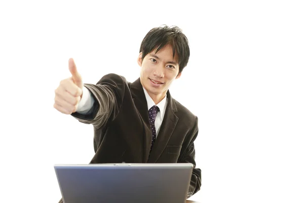 Smiling Asian businessman — Stock Photo, Image