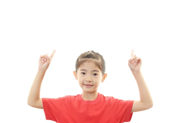 Menina asiática apontando — Fotografia de Stock