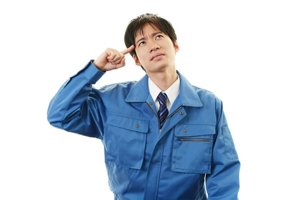 Tired and stressed Asian worker — Stock Photo, Image