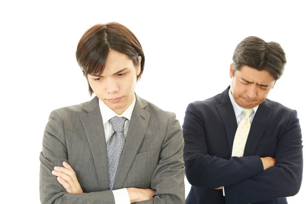 Empresários asiáticos stressados — Fotografia de Stock