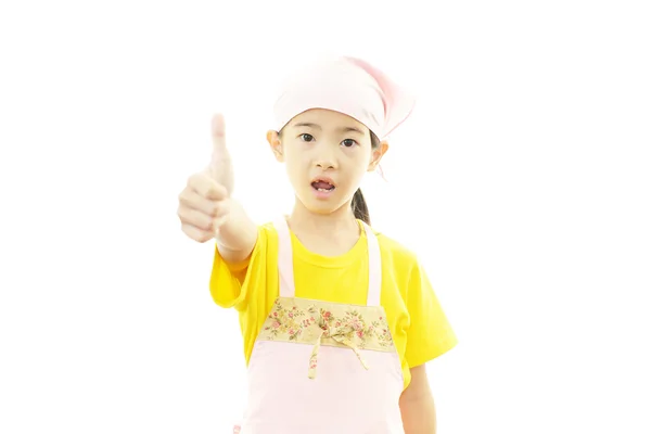 Girl in an apron — Stock Photo, Image