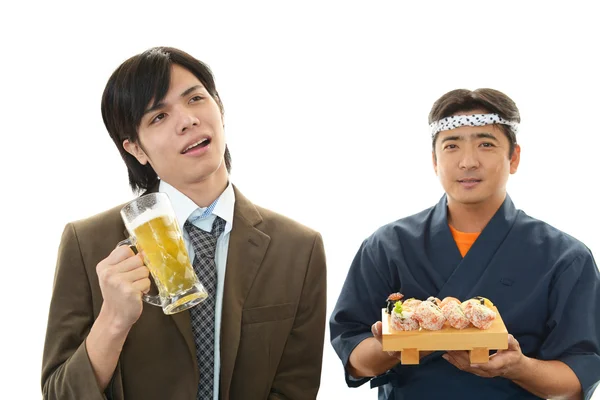Sushi chef and customer — Stock Photo, Image