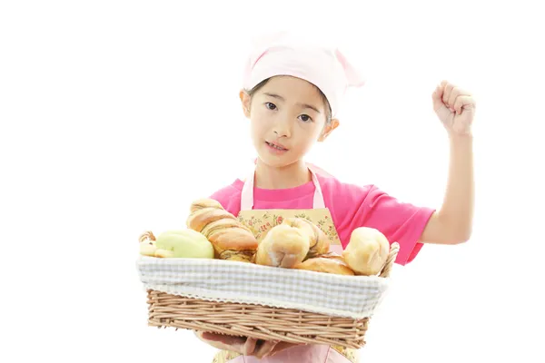 Meisje met brood — Stockfoto