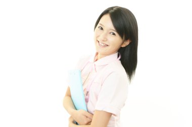 Asyalı kadın hemşire gülümseyen