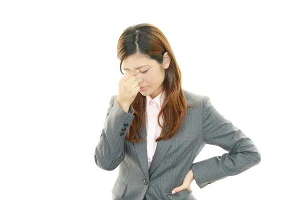 Mujer joven con dolor de cabeza —  Fotos de Stock