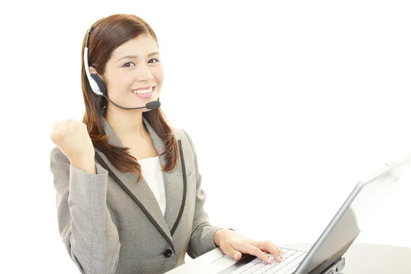 Smiling call center operator — Stock Photo, Image