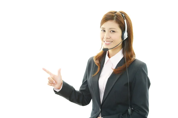 Operador de call center sorridente — Fotografia de Stock