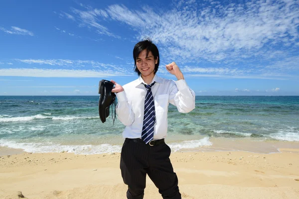 Man op het strand — Stockfoto