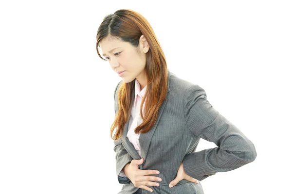 Business woman with stomachache — Stock Photo, Image