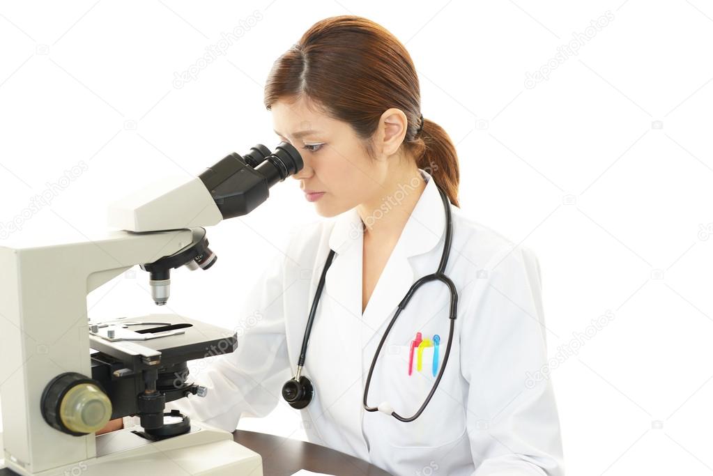 Doctor with a microscopic examination