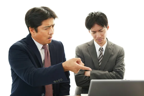 Stressed Asian businessmen — Stock Photo, Image