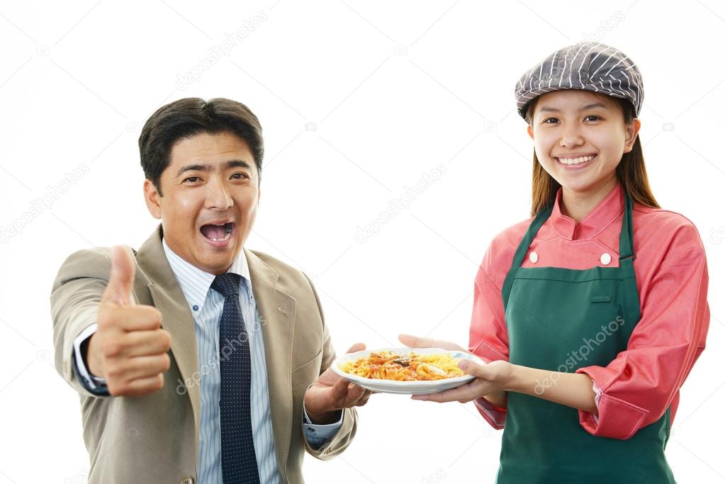 Smiling waitress and customer