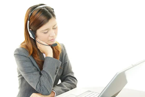 Tired call center operator — Stock Photo, Image