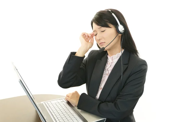 Tired call center operator — Stock Photo, Image