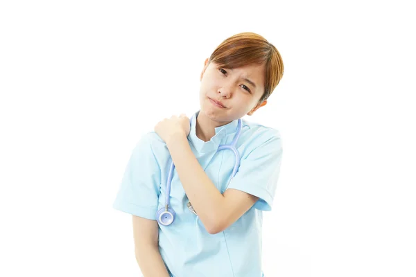 Enfermera con dolor de hombro . — Foto de Stock
