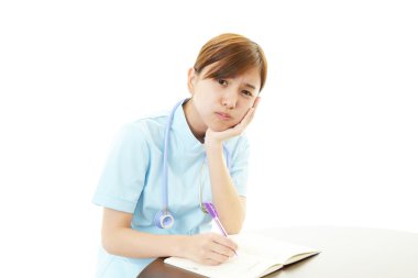 Depresyonda Asyalı kadın hemşire