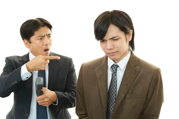 Stressed Asian businessmen — Stock Photo, Image