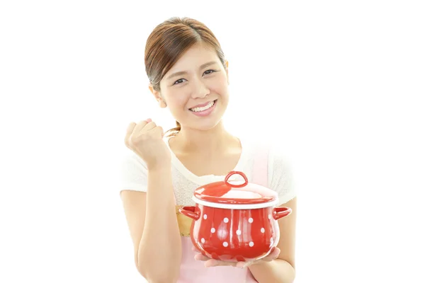 A woman wearing apron — Stock Photo, Image