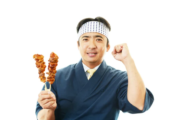 Japanese chef with yakitori — Stock Photo, Image