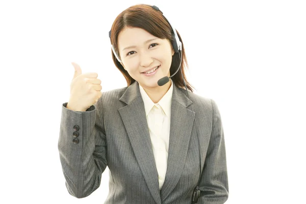 Smiling call center operator — Stock Photo, Image