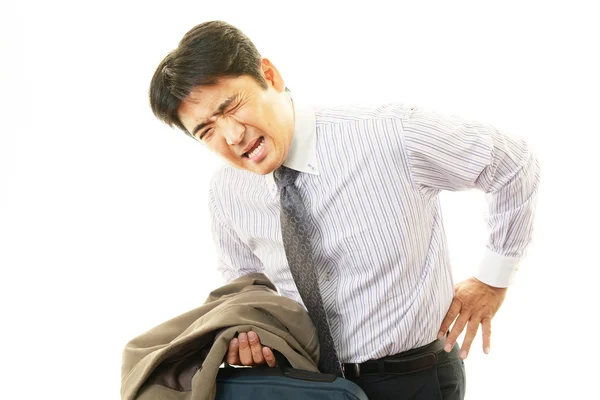 Empresario con dolor de espalda —  Fotos de Stock