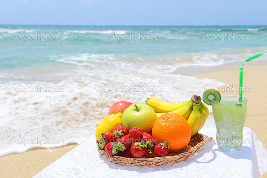 Fruits, drink and beautiful beach