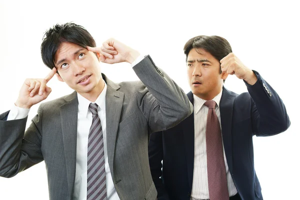 Empresários asiáticos stressados — Fotografia de Stock