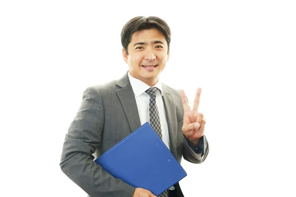 The male office worker who poses happily — Stock Photo, Image