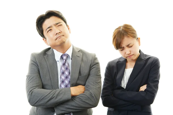 Stressed businessman and businesswoman — Stock Photo, Image