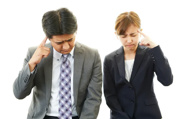 Homme d'affaires stressé et femme d'affaires — Stockfoto