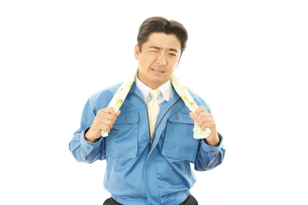 Tired and stressed Asian worker — Stock Photo, Image