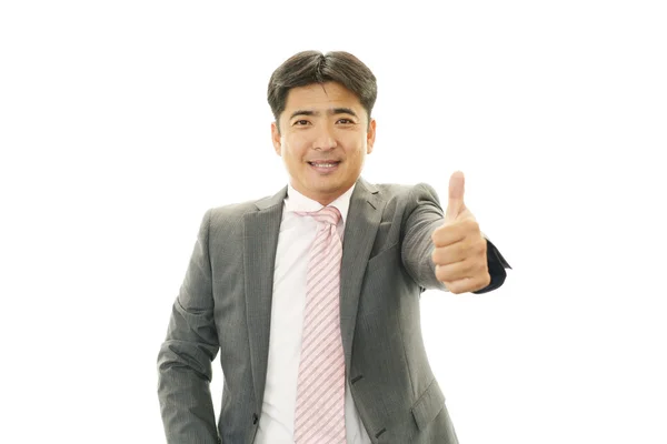 Smiling Asian businessman — Stock Photo, Image