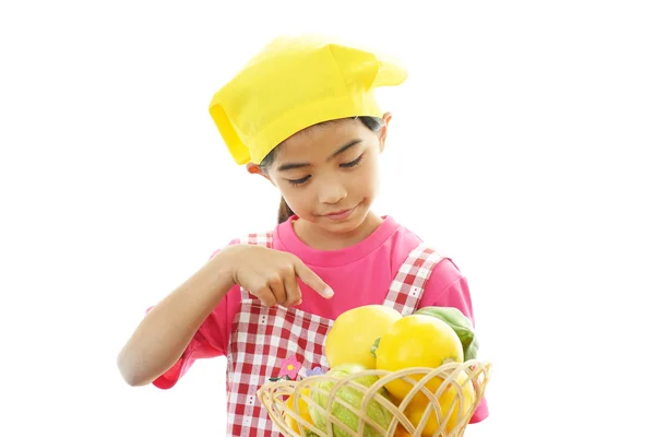 Sonriente chica sosteniendo fruta —  Fotos de Stock