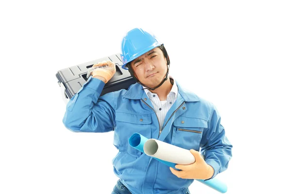 Tired and stressed Asian worker — Stock Photo, Image