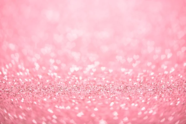 Fundo romântico rosa com corações, bokeh para o dia dos namorados, brilhos brilhantes — Fotografia de Stock