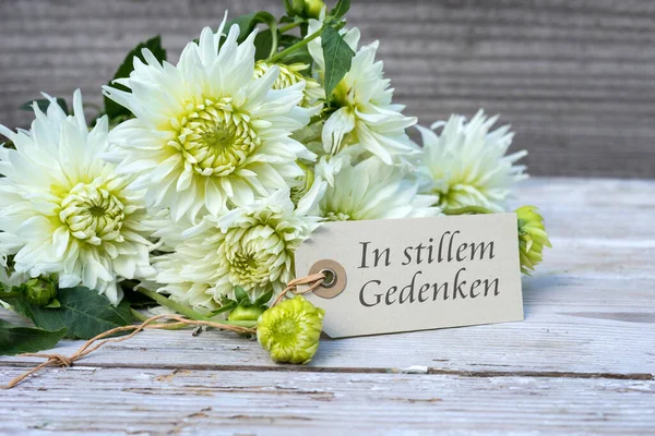 Mourning Card White Dahlias German Text Silent Memory — стокове фото